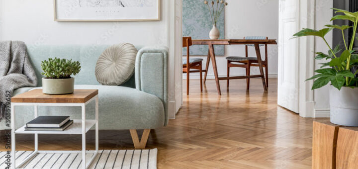Stylish scandinavian living room with design mint sofa, furnitures, mock up poster map, plants and elegant personal accessories. Modern home decor. Open space with dining room. Template Ready to use.